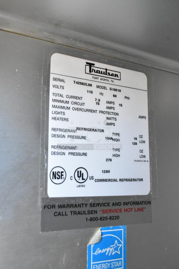 Traulsen commercial refrigerator label, Model G10010, Serial T42562L06, 115 volts, NSF and UL listed, Energy Star rated.