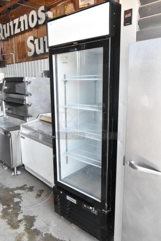 Empura commercial glass door refrigerator, black, with four shelves, in good condition. Model label on front.