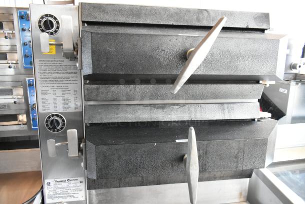 Cleveland Range steamer; dual compartment, manual controls, black handles, operating instructions label, NSF certified.