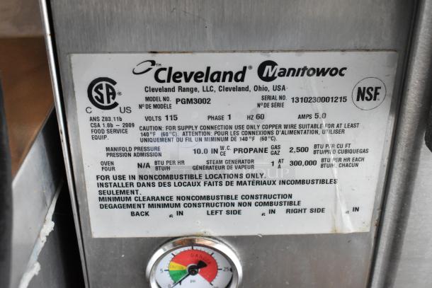 Cleveland Manitowoc label on a steam generator, model PGM3002, 115 volts, propane gas, serial number 1310230001215, NSF certified.