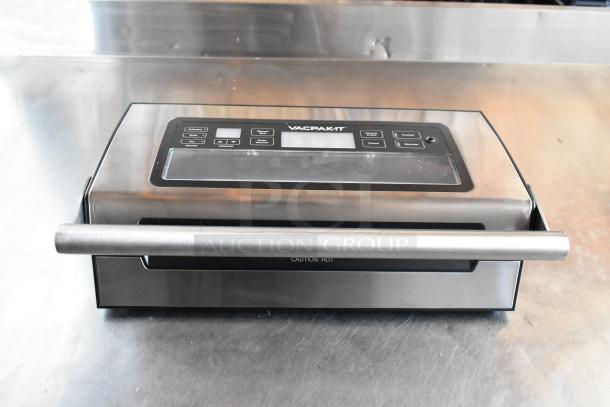 VACPAK-IT vacuum sealer in stainless steel, digital controls, "Caution: Hot" label, excellent condition.