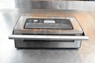 VACPAK-IT vacuum sealer in stainless steel, digital controls, "Caution: Hot" label, excellent condition.
