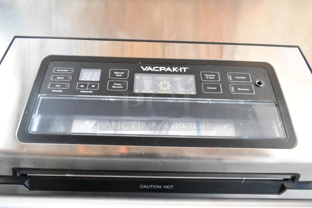 VacPak-It vacuum sealer, stainless steel, digital controls, multiple sealing modes, "Caution: Hot" label, excellent condition.