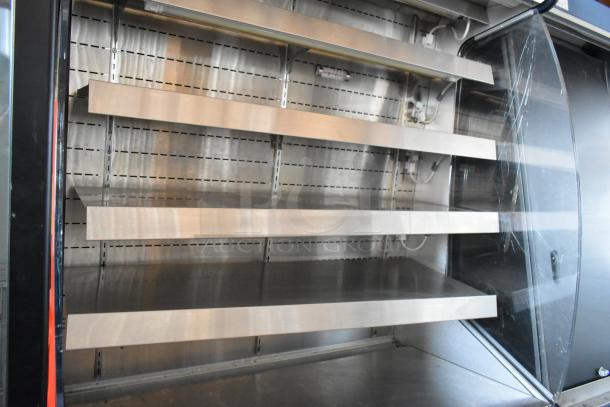 Commercial stainless steel display fridge, four shelves, glass door, good condition, suitable for bakery or deli use.