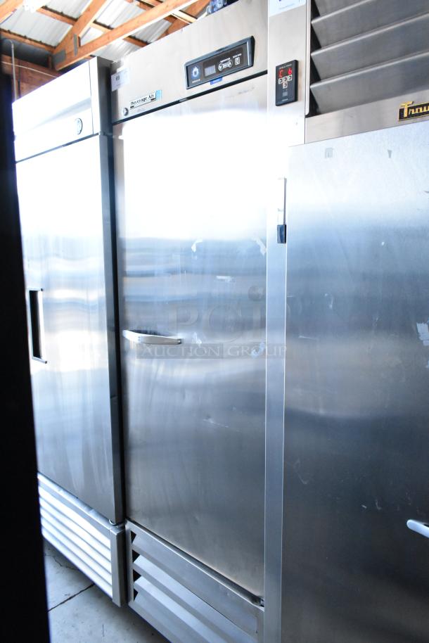 Stainless steel commercial refrigerator, Beverage-Air model, integrated digital controls, signs of light wear.
