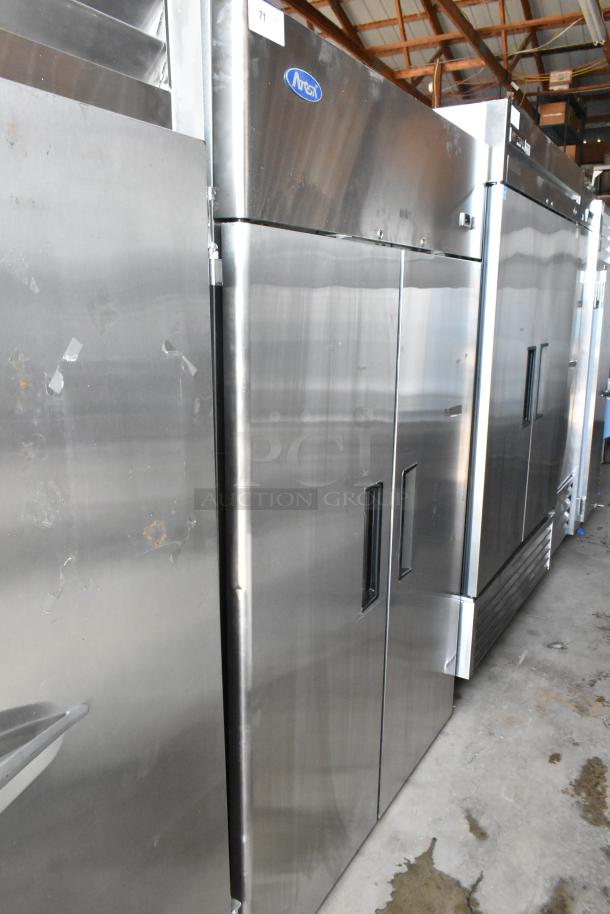 Arctic stainless steel commercial refrigerator, double doors, excellent condition, visible Arctic logo, auction item number 71.