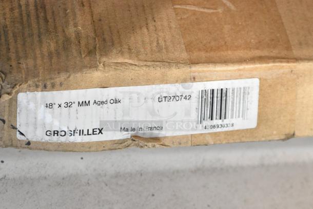 Grosfillex aged oak panel, 18"x32", with visible label indicating model UT270742, made in France. Packaging shows wear.