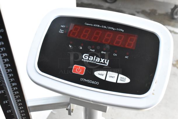 Galaxy 177MSD600 scale, capacity 600lb/300kg, digital display, tare, unit, and hold functions, in good condition.
