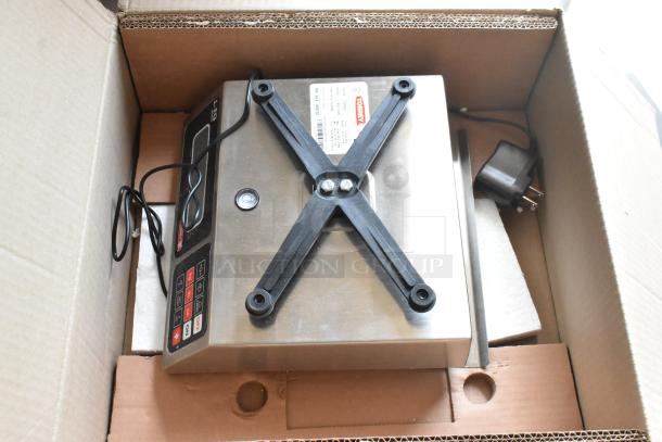Stainless steel Torrey digital scale in original packaging, model L-PC, new condition, power cable included.