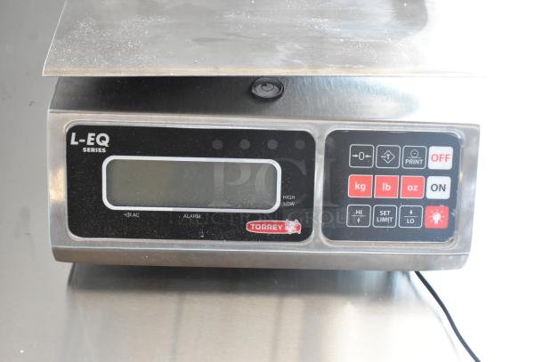 Torrey L-EQ series digital scale, stainless steel, with control panel, button labels in kg, lb, oz, used condition.