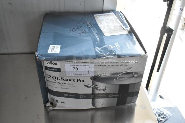 Vigor 22 Qt. Sauce Pot with cover in box, aluminum clad, SS1 series. Box is worn and taped, auction sticker #78 visible.