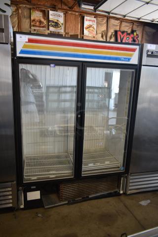 True two-door commercial display refrigerator, glass doors, striped design, EBT label, good condition, shelves included.
