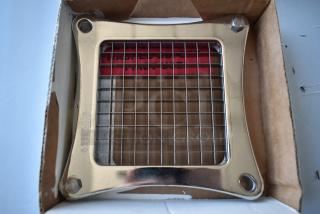 Metal grid slicer in box, mint condition. Stamped "03.16.2023" on the side. Ideal for precise cutting tasks.