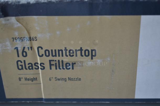 16" countertop glass filler box showing model 750GFN86S, 8" height, 6" swing nozzle. Packaging shows signs of wear.