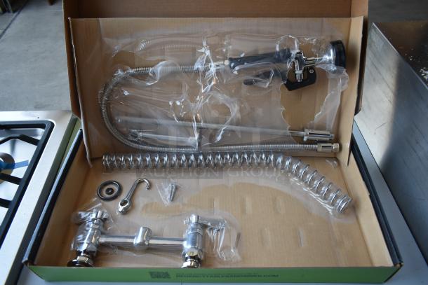 Commercial kitchen pre-rinse faucet kit, stainless steel, includes flexible hose, spray valve, mounting hardware. New in box.