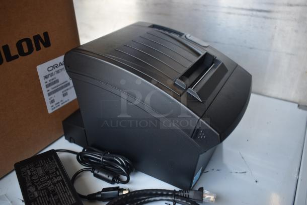 Bixolon thermal receipt printer, black, includes power supply and cables, model number visible on box label.