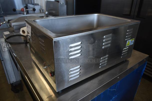 Stainless steel commercial food warmer, model by Meco, used condition, with vented sides and control knobs.