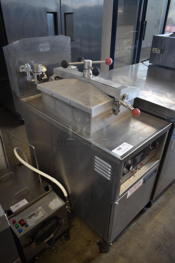 Stainless steel pressure fryer with manual controls, labeled "Pressure Fryer 540," in good condition; item tag "100".