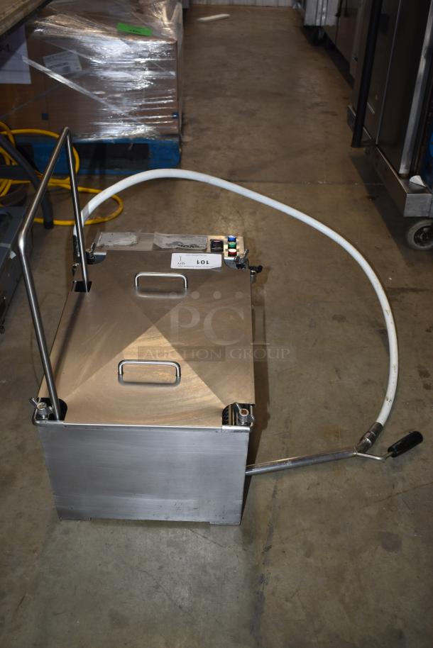 Stainless steel industrial fluid dispenser, with hose and handle, in used condition. Labels include "AID" and "LOL".