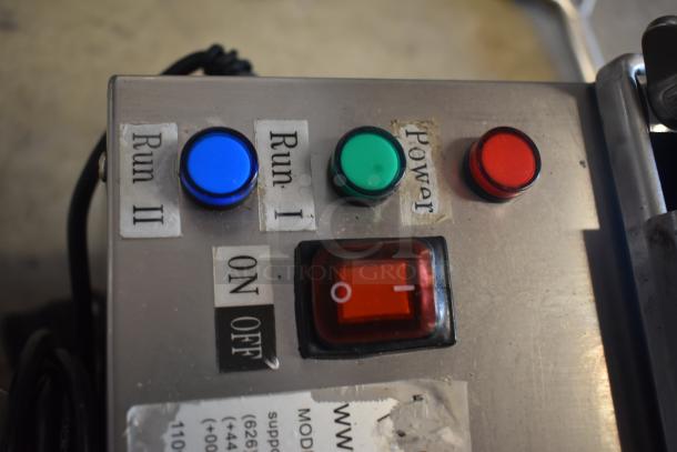 Control panel with labeled buttons: blue "Run II," green "Run I," red "Power." Red toggle switch marked "ON/OFF." In good condition.