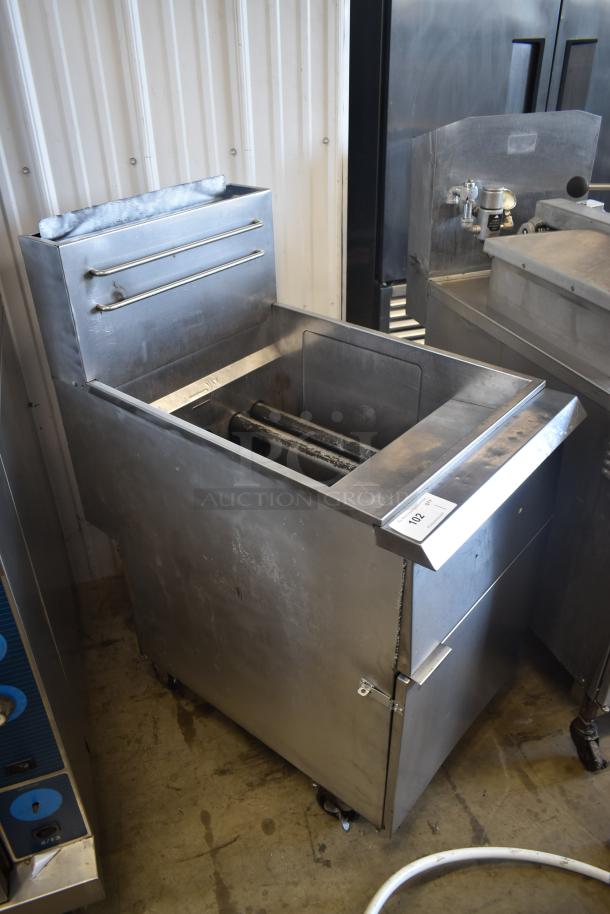 Commercial stainless steel hot dog roller grill with storage compartment, in fair condition. Auction tag labeled "102".