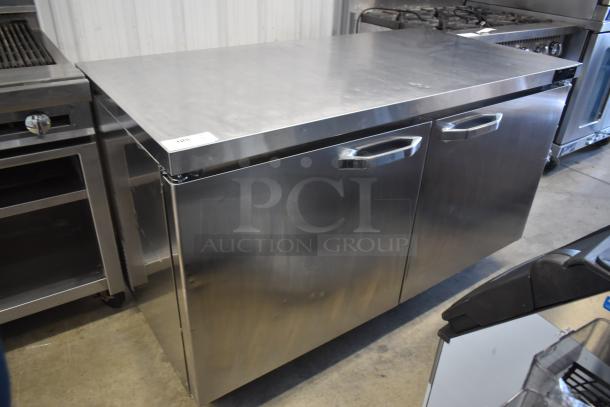 Stainless steel double-door commercial kitchen cabinet, in good condition, smooth top surface, item number 105.
