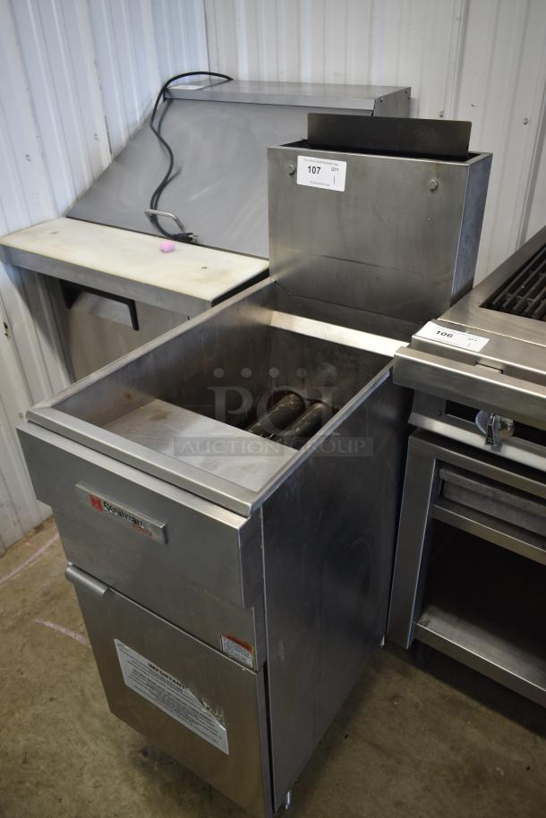 Commercial stainless steel deep fryer in used condition. Includes serial number label and instructions. Model: Southbend Pro.