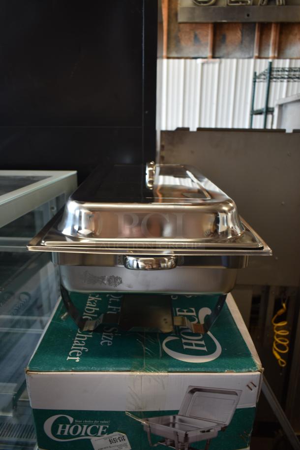 Stainless steel chafing dish, rectangular, with lid, in excellent condition. Box marked "Choice" for catering use.