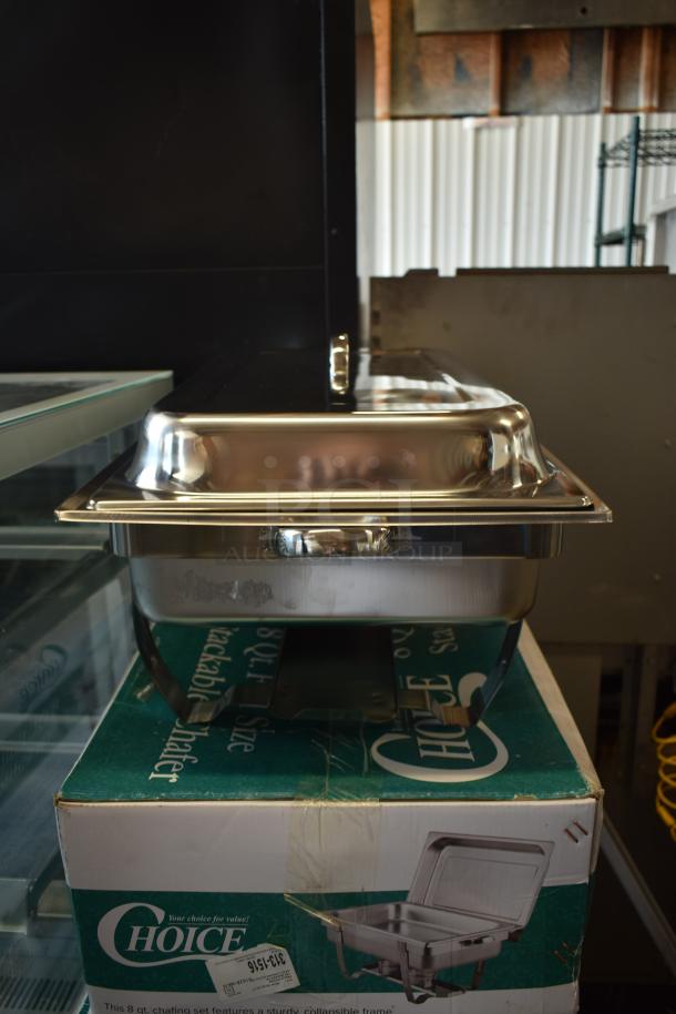 Stainless steel chafing dish on Choice box. Includes lid and stand. Appears new. Box indicates 8 qt size, collapsible frame.