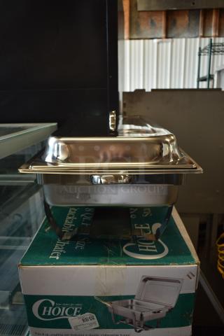 Stainless steel chafing dish on Choice box. Includes lid and stand. Appears new. Box indicates 8 qt size, collapsible frame.
