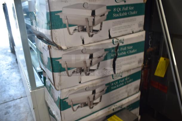 Stack of dented boxes containing 8 Qt. full-size stackable chafers by Choice. Boxes show wear and damage.