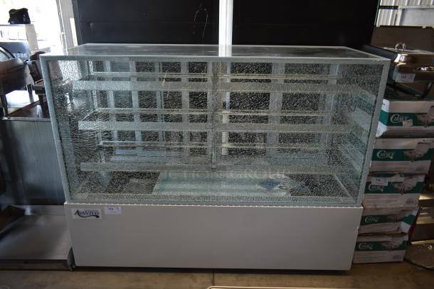 Shattered glass display case, Avantco brand, cracked safety glass, three shelves, white base, light signs of wear, auction label.