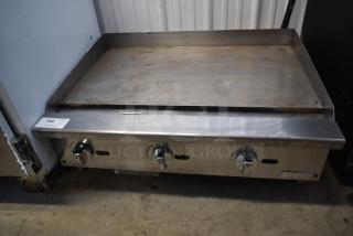 Migali Stainless Steel Commercial Countertop Natural Gas Powered Flat Top Griddle.