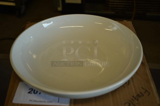 BRAND NEW SCRATCH AND DENT! Front of the House DBO171WHP22 Harmony 48 oz. Bright White Low Round Porcelain Bowl - 6/Case - Image 1 of 3