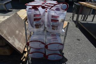 Chrome Finish 3 Tier Wire Shelving Unit w/ Rubbermaid Clear Poly Bins.  BUYER MUST DISMANTLE. PCI CANNOT DISMANTLE FOR SHIPPING. PLEASE CONSIDER FREIGHT CHARGES.
