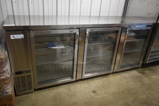 Avantco three-door commercial glass-front refrigerator, stainless steel, new condition, with label indicating model and temperature controls.