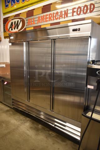 Stainless steel commercial refrigerator with three doors, used condition, branded A&W, suitable for restaurant use.