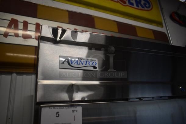 Avantco commercial refrigeration unit with visible dent. Label indicates model and brand. Auction item 5.