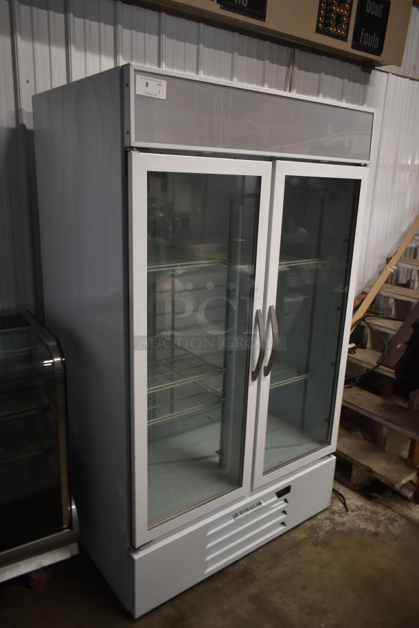 Commercial glass-door refrigerator, double-door, Beverage-Air brand, in good condition with visible shelving.