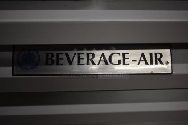 Beverage-Air refrigerator label, stainless steel trim, brand name prominent, indicating quality commercial cooling equipment.