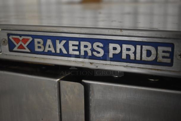 Bakers Pride commercial oven, stainless steel, visible logo, minor wear. Reliable brand for professional baking.