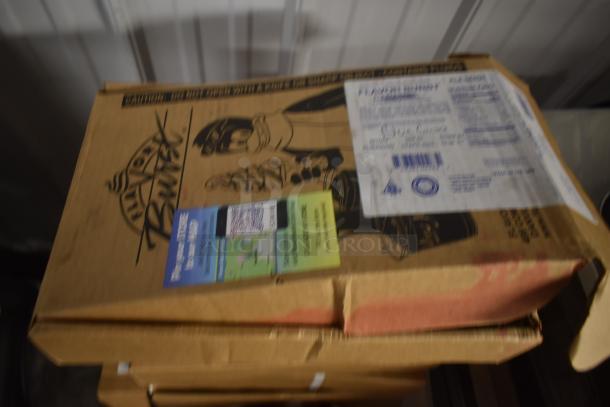 Sealed cardboard box with graphics and labels, indicating an unopened package. Slight wear on edges.