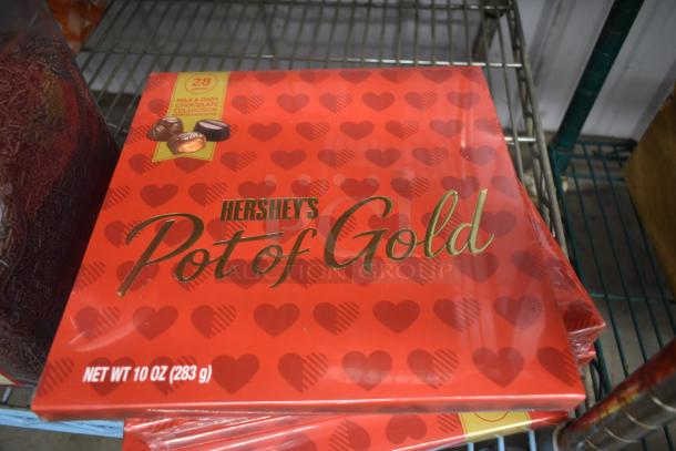 Hershey's Pot of Gold chocolate box, 10 oz, red heart-themed design, milk and dark assortment. Sealed condition.