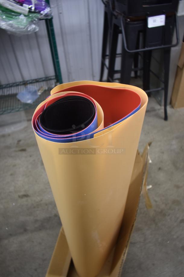 Rolled sheets in orange, red, blue, and black vinyl. New condition, stored in a cardboard box, good for crafting or signage.