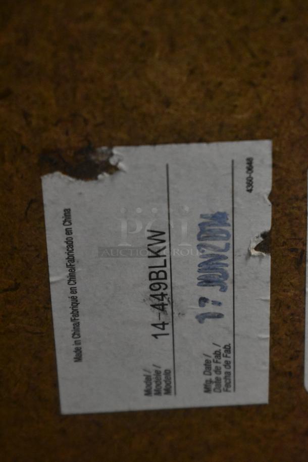 Label on brown surface showing "Made in China," model "14-449BLKW," date "17 JUNE 2014."