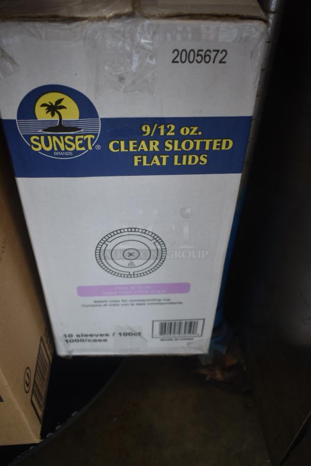 Box of Sunset 9/12 oz. clear slotted flat lids, 1000 count, sealed. Includes barcode and item number 2005672.