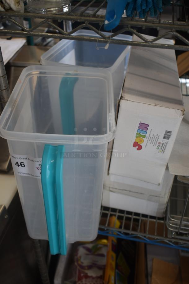 Transparent storage container with blue handle and label "46" for PCI Auctions. Nearby box labeled "JOYIN" on a metal shelf.