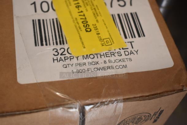 Box labeled "Happy Mother's Day" from 1-800-Flowers.com, containing 8 buckets. Brown packaging with barcode and yellow tag.