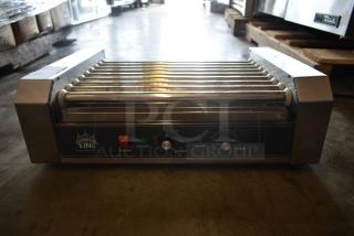 Carnival King hot dog roller grill with stainless steel rollers, dual control knobs, and power indicator. Excellent condition.