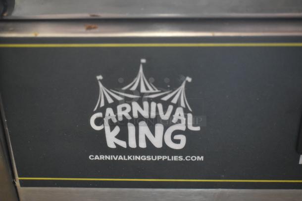 Carnival King concession equipment logo with website URL, featuring a circus tent design on a metal surface.
